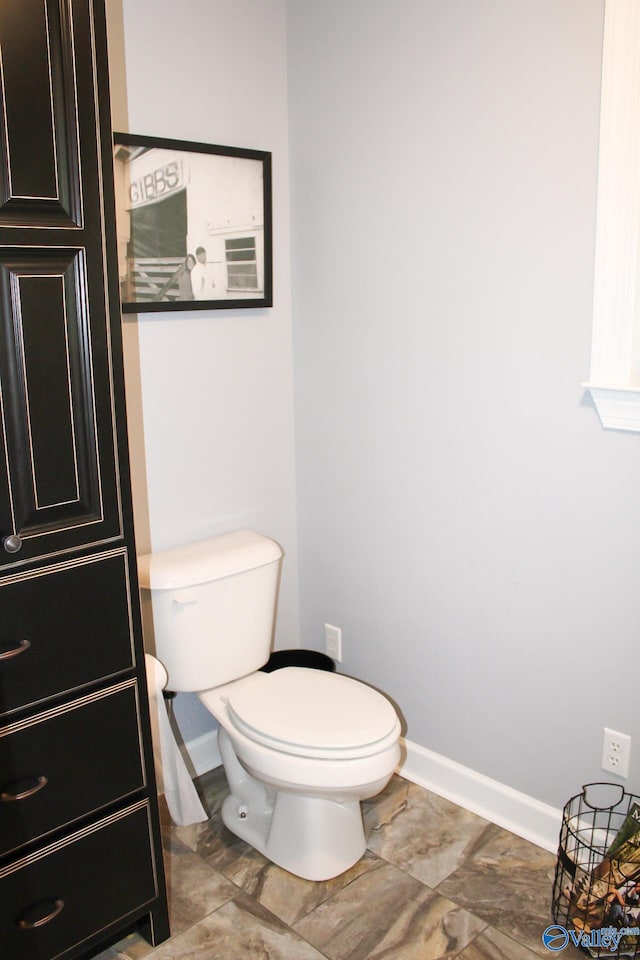 bathroom featuring toilet