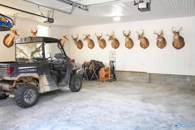 garage featuring a garage door opener