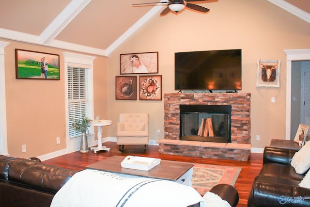 living room with wood-type flooring, a fireplace, lofted ceiling, and ceiling fan