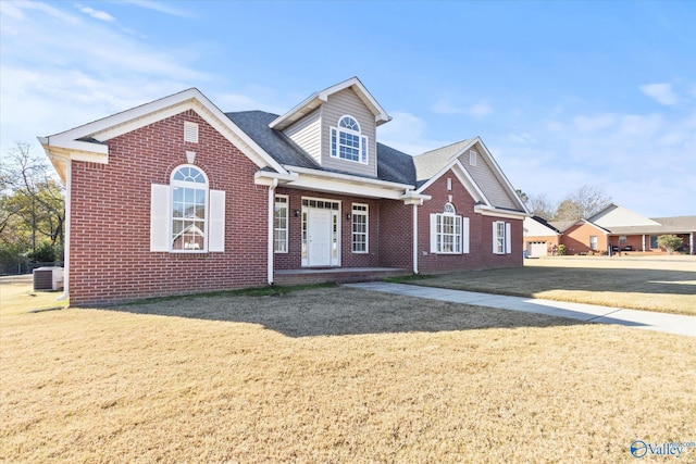 view of front of home featuring central AC unit and a front lawn