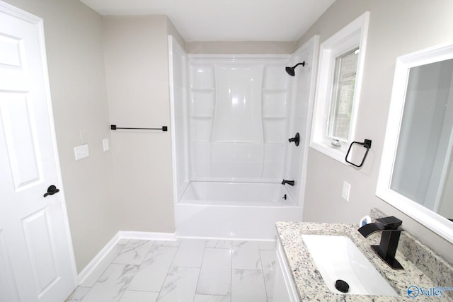 bathroom with vanity and tub / shower combination