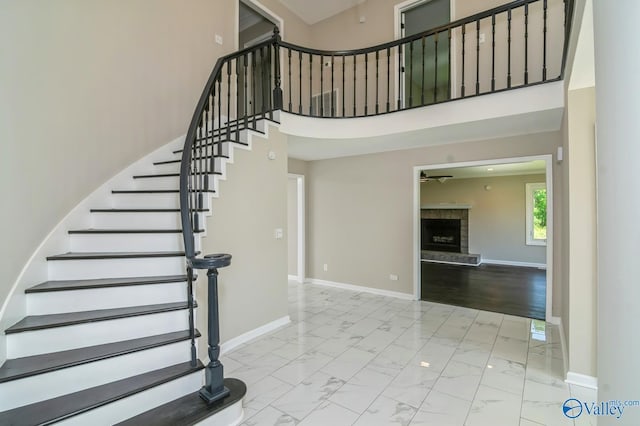 stairway with a towering ceiling