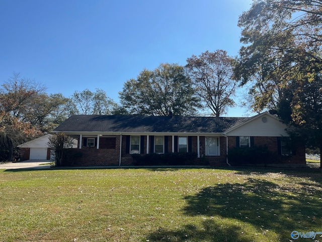 single story home with a front lawn and a garage