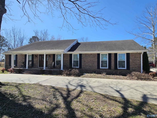 809 Kyle Rd NE, Hartselle, AL 35640 - ranch-style home with brick siding, covered porch, and roof with shingles