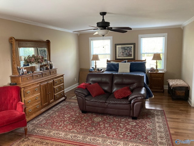 bedroom with ceiling fan, crown molding, and wood-type flooring