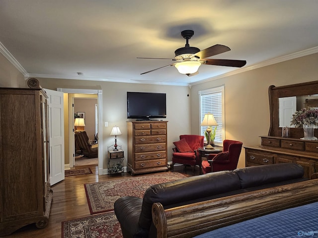 809 Kyle Rd NE, Hartselle, AL 35640 - living area featuring dark wood-style flooring, ceiling fan, and ornamental molding