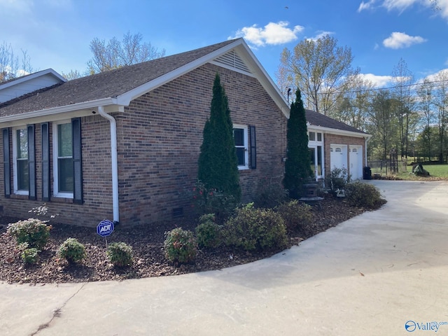 view of home's exterior with a garage