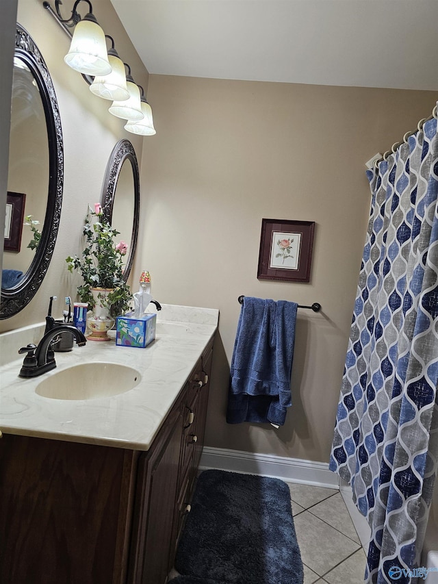 809 Kyle Rd NE, Hartselle, AL 35640 - full bath featuring vanity, tile patterned floors, and baseboards
