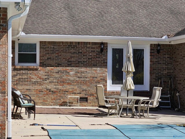 809 Kyle Rd NE, Hartselle, AL 35640 - view of patio featuring a covered pool and french doors