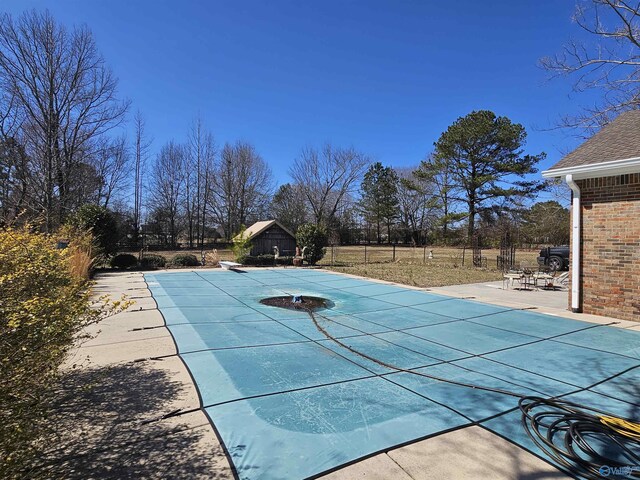 809 Kyle Rd NE, Hartselle, AL 35640 - view of pool with a diving board, a covered pool, and a patio area