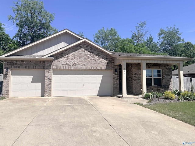 117 Edensmith Dr, New Market, AL 35761 - single story home with a garage, brick siding, and concrete driveway
