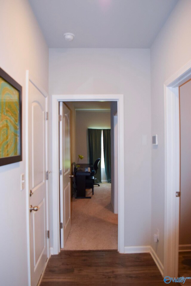 117 Edensmith Dr, New Market, AL 35761 - hallway featuring dark wood-style flooring and baseboards