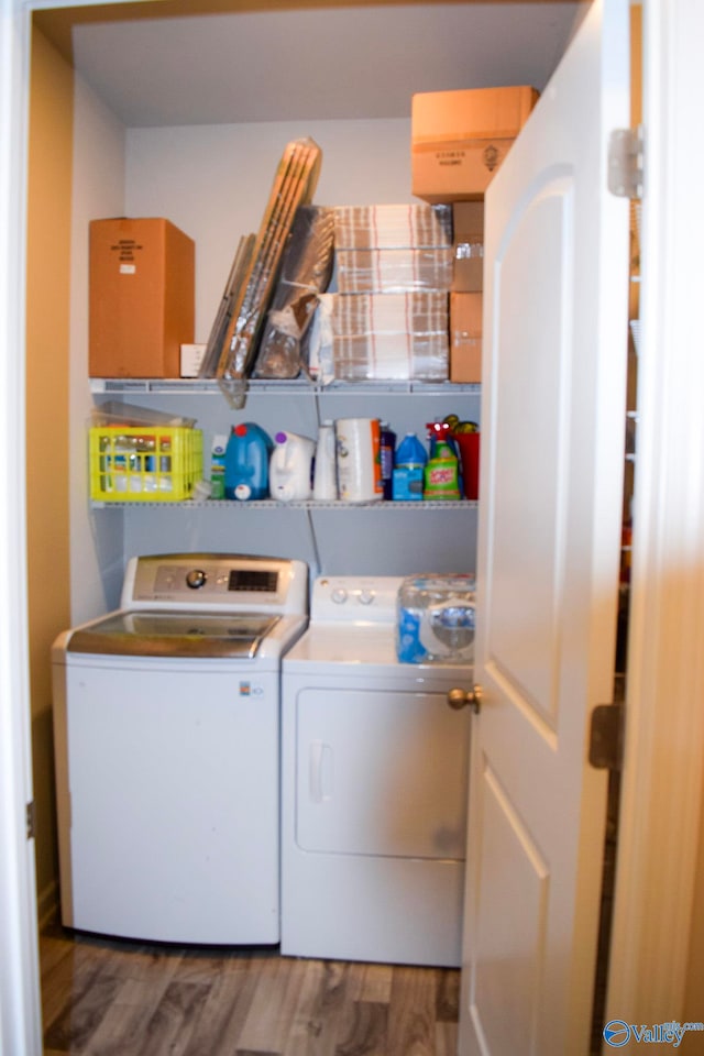 117 Edensmith Dr, New Market, AL 35761 - laundry room with washer and clothes dryer and wood finished floors