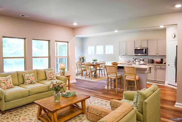 117 Edensmith Dr, New Market, AL 35761 - living room with light wood-type flooring and recessed lighting