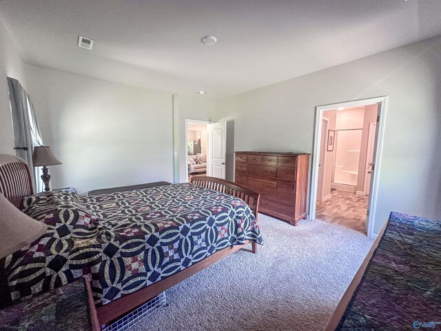 117 Edensmith Dr, New Market, AL 35761 - bedroom with carpet, ensuite bath, and baseboards