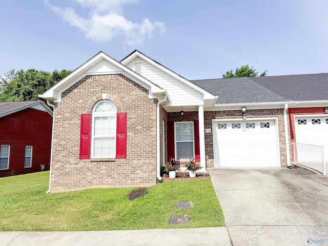110 Santana Dr, Athens, AL 35611 - single story home with a garage, brick siding, concrete driveway, a front yard, and a shingled roof