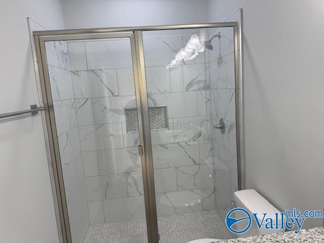 17194 Red Hill Rd, Athens, AL 35611 - full bathroom with a shower stall