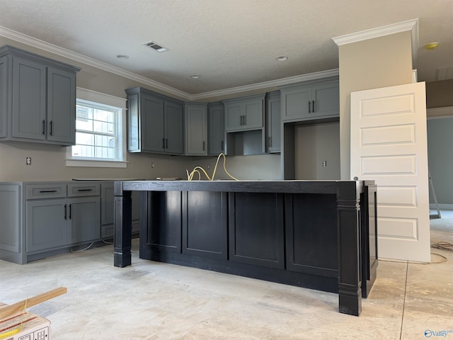 kitchen with crown molding and gray cabinets