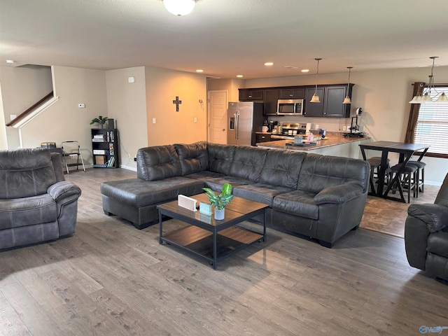 living area featuring recessed lighting and wood finished floors