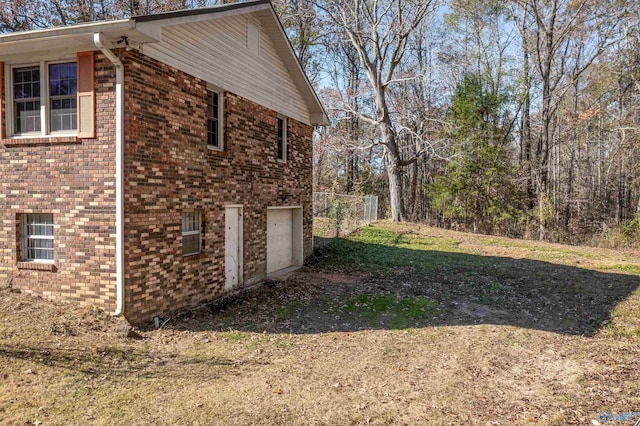 view of side of home featuring a garage