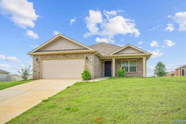 view of front of home featuring a garage and a front lawn