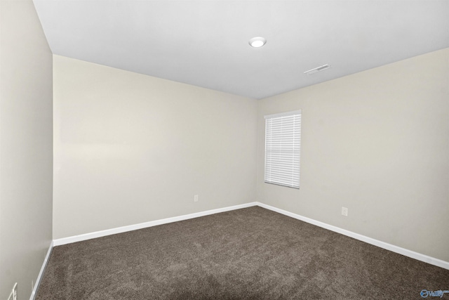 165 Meadowridge Dr, Hazel Green, AL 35750 - unfurnished room featuring dark colored carpet and baseboards