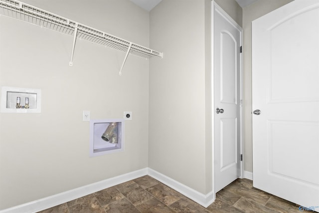 165 Meadowridge Dr, Hazel Green, AL 35750 - clothes washing area with hookup for a washing machine, hookup for an electric dryer, baseboards, and dark stone finish flooring