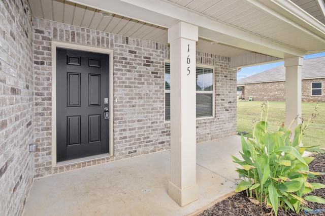 165 Meadowridge Dr, Hazel Green, AL 35750 - property entrance featuring brick siding and covered porch