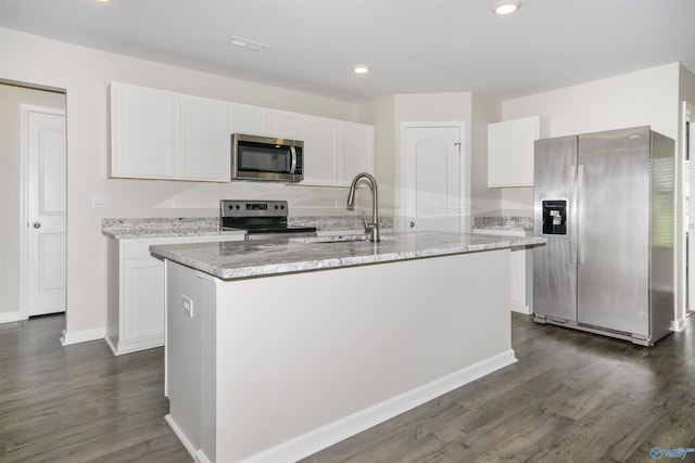165 Meadowridge Dr, Hazel Green, AL 35750 - kitchen with appliances with stainless steel finishes, a sink, white cabinetry, dark wood finished floors, and recessed lighting