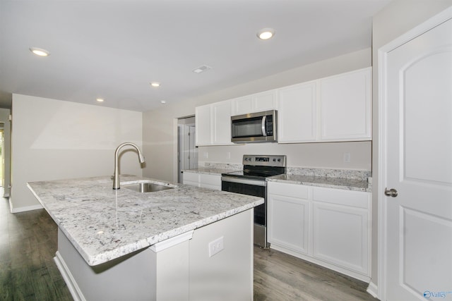 165 Meadowridge Dr, Hazel Green, AL 35750 - kitchen with stainless steel appliances, a sink, white cabinets, a kitchen island with sink, and dark wood-type flooring
