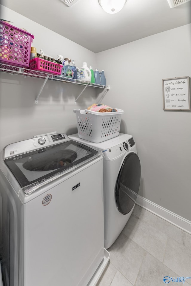 laundry room featuring washer and dryer