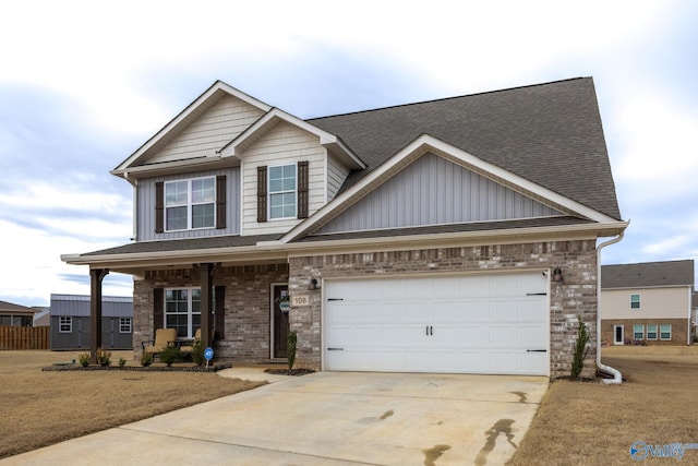 craftsman inspired home with a porch, a garage, and a front lawn