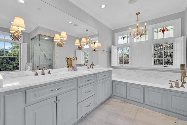 bathroom featuring an inviting chandelier, double vanity, ornamental molding, a shower stall, and marble finish floor