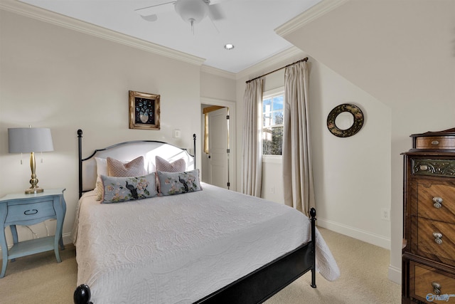 bedroom with light colored carpet, ceiling fan, baseboards, and ornamental molding