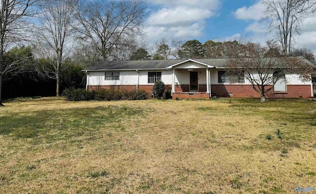 ranch-style home with a front lawn and brick siding