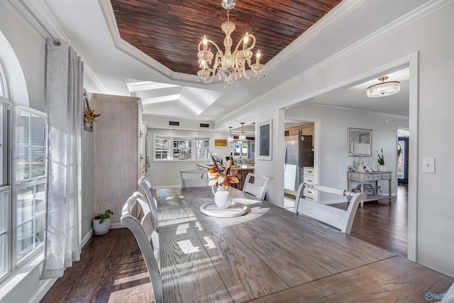 dining space featuring a chandelier, ornamental molding, a raised ceiling, and dark wood-type flooring