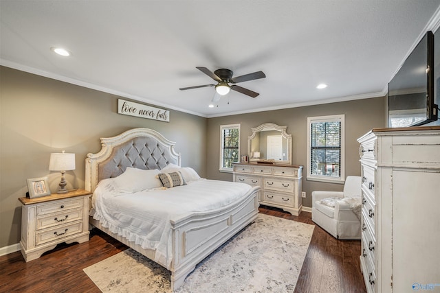 bedroom featuring dark hardwood / wood-style floors, ceiling fan, and crown molding