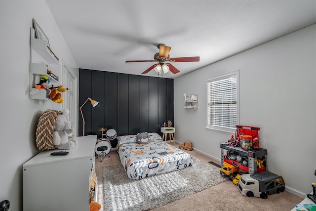 carpeted bedroom featuring ceiling fan