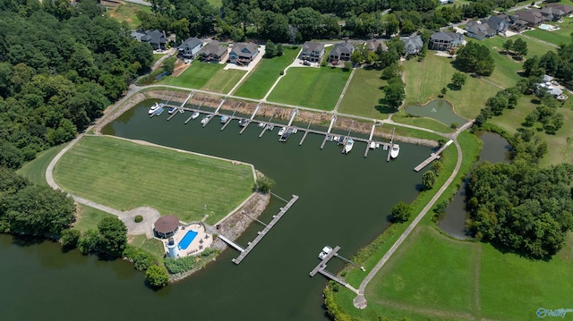 birds eye view of property featuring a residential view and a water view