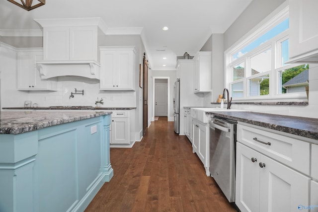 kitchen featuring recessed lighting, dark wood-type flooring, white cabinetry, dishwasher, and tasteful backsplash