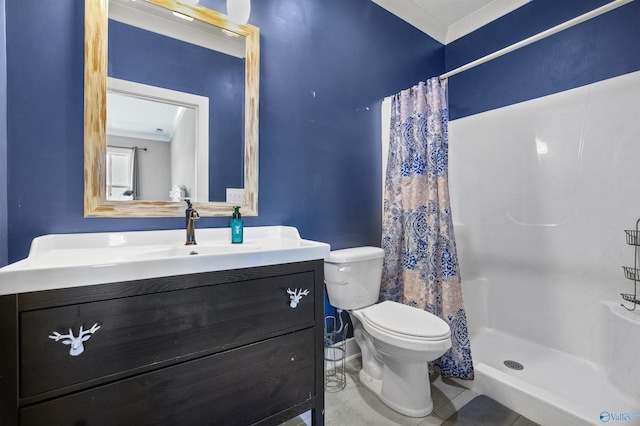 full bathroom featuring vanity, a shower stall, and toilet