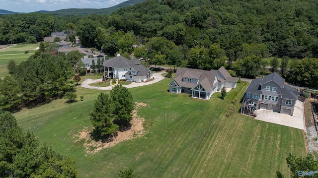 aerial view featuring a forest view