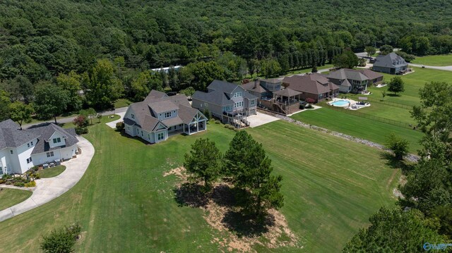 bird's eye view featuring a residential view and a view of trees