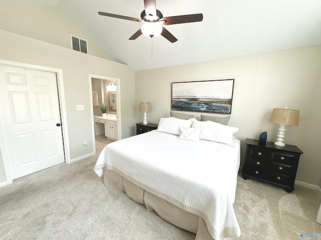 2072 Madison Villas Way Unit 2072, Madison, AL 35758 - bedroom featuring light colored carpet, vaulted ceiling, baseboards, ensuite bathroom, and ceiling fan
