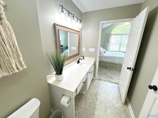 2072 Madison Villas Way Unit 2072, Madison, AL 35758 - bathroom featuring ensuite bathroom, vanity, toilet, tile patterned flooring, and baseboards