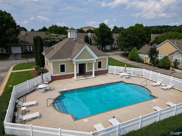 2072 Madison Villas Way Unit 2072, Madison, AL 35758 - community pool with a patio area and a fenced backyard