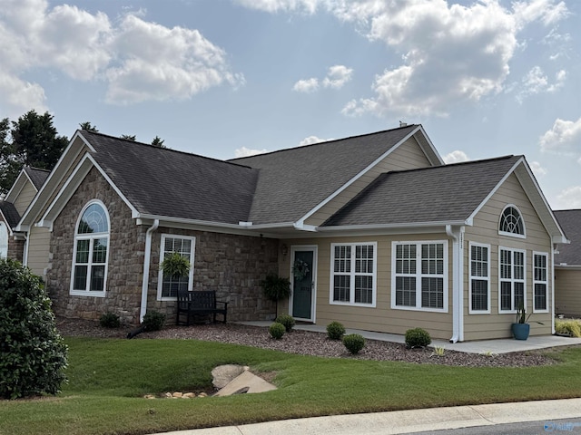2072 Madison Villas Way Unit 2072, Madison, AL 35758 - ranch-style house featuring stone siding, a front yard, and roof with shingles