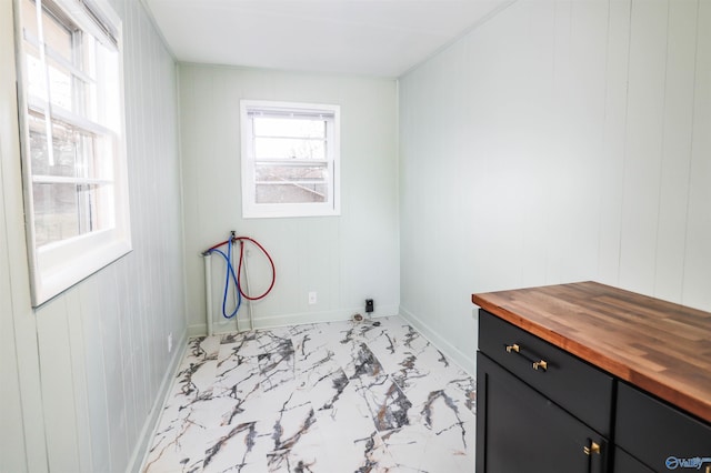 6670 Moores Mill Rd, Huntsville, AL 35811 - washroom featuring cabinet space, baseboards, marble finish floor, and hookup for a washing machine