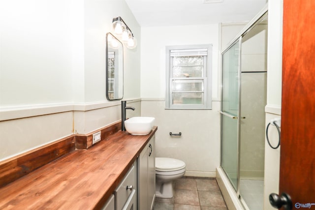 6670 Moores Mill Rd, Huntsville, AL 35811 - bathroom with vanity, tile patterned floors, toilet, and a shower stall
