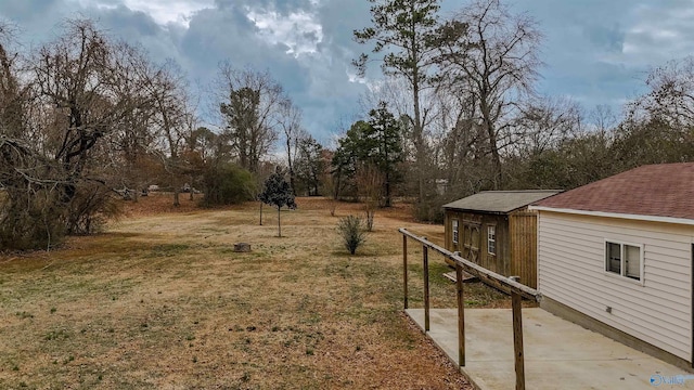 6670 Moores Mill Rd, Huntsville, AL 35811 - view of yard with an outbuilding and a patio area